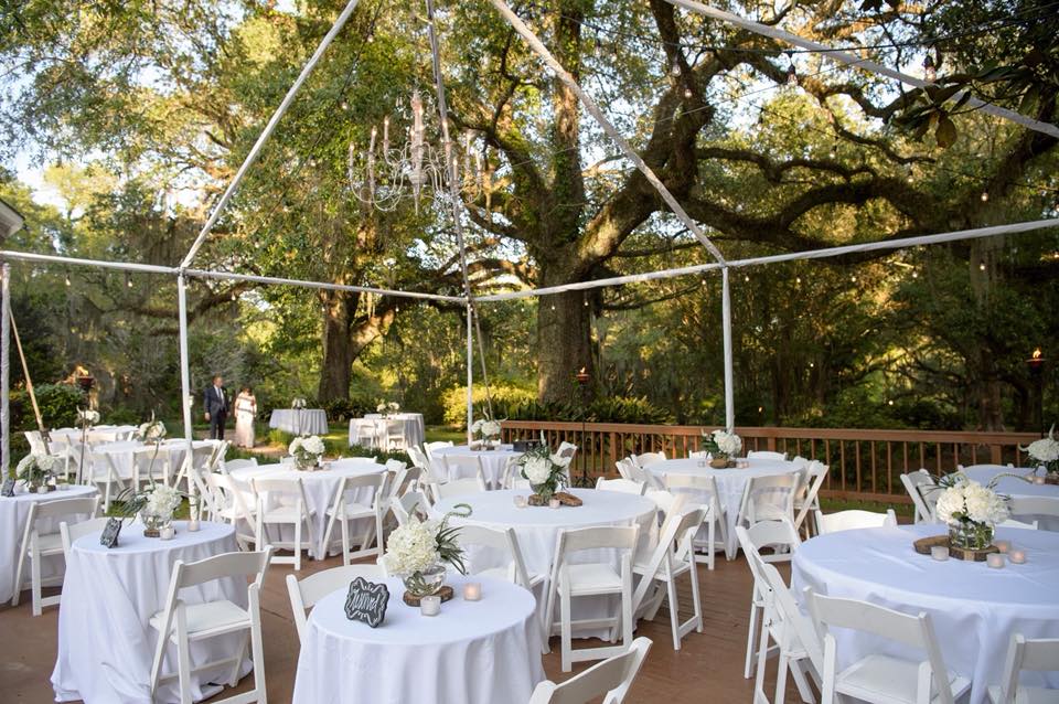 Outdoor plate settings for a wedding reception